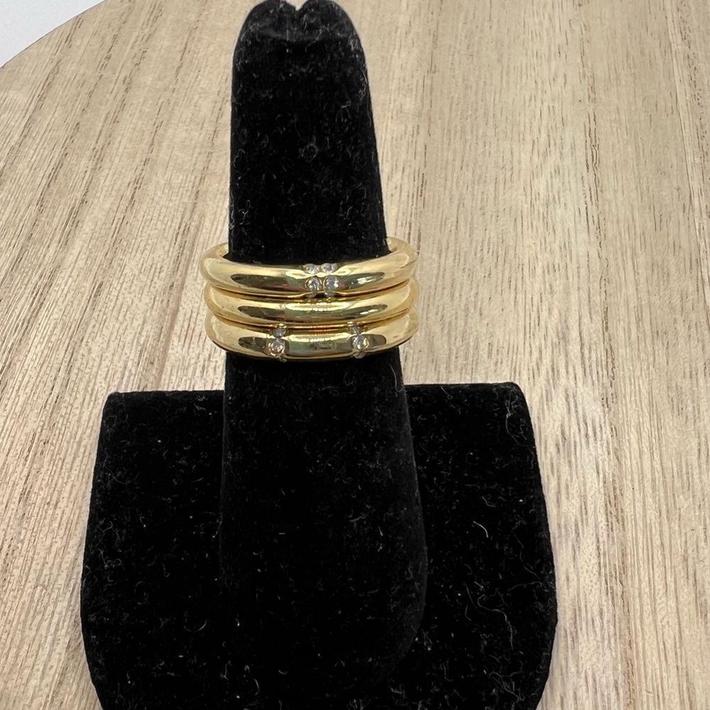 Set of three gold tone rhinestone studded bands - size 6.5